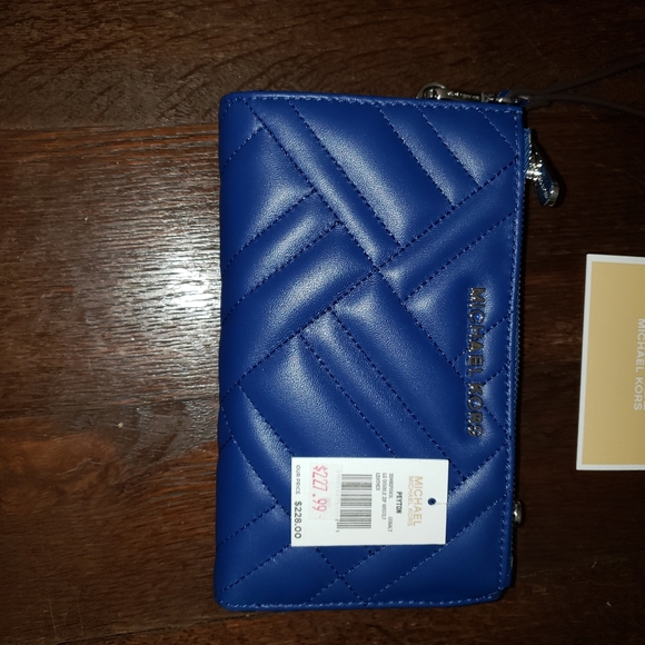 Michael Kors backpack and wristlet